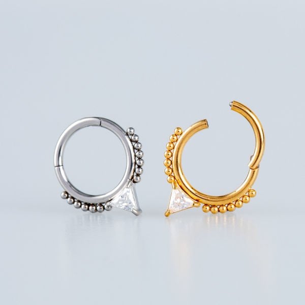 Ring Piercing Segmented Stone