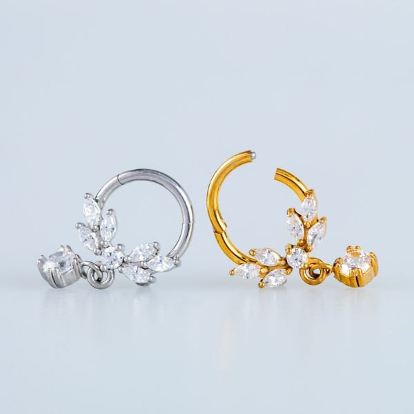 Ring Piercing Segmented Stone
