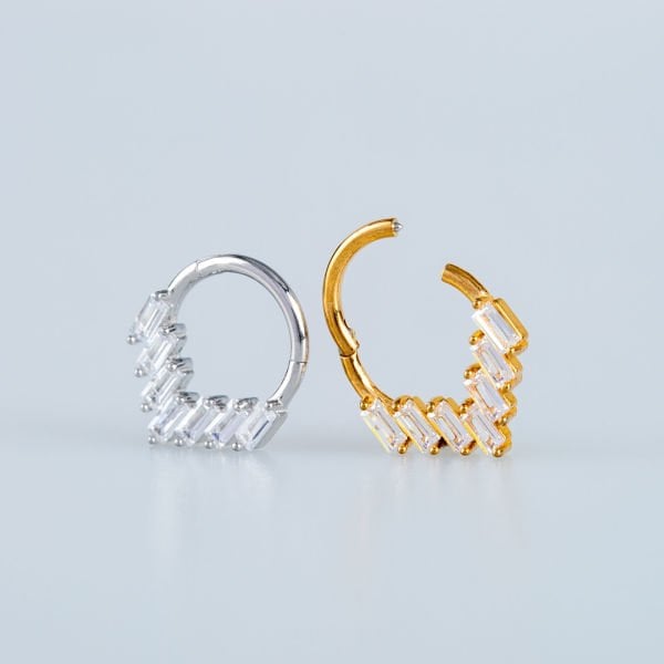 Ring Piercing Segmented Stone