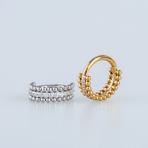 Ring Piercing Segmented Stone
