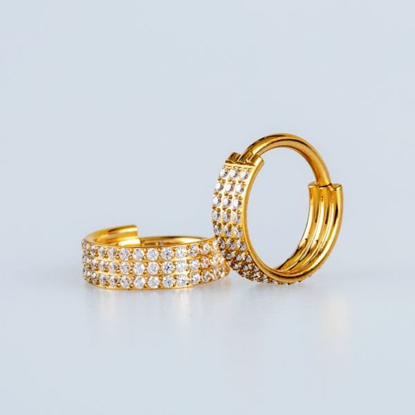 Ring Piercing Segmented Stone