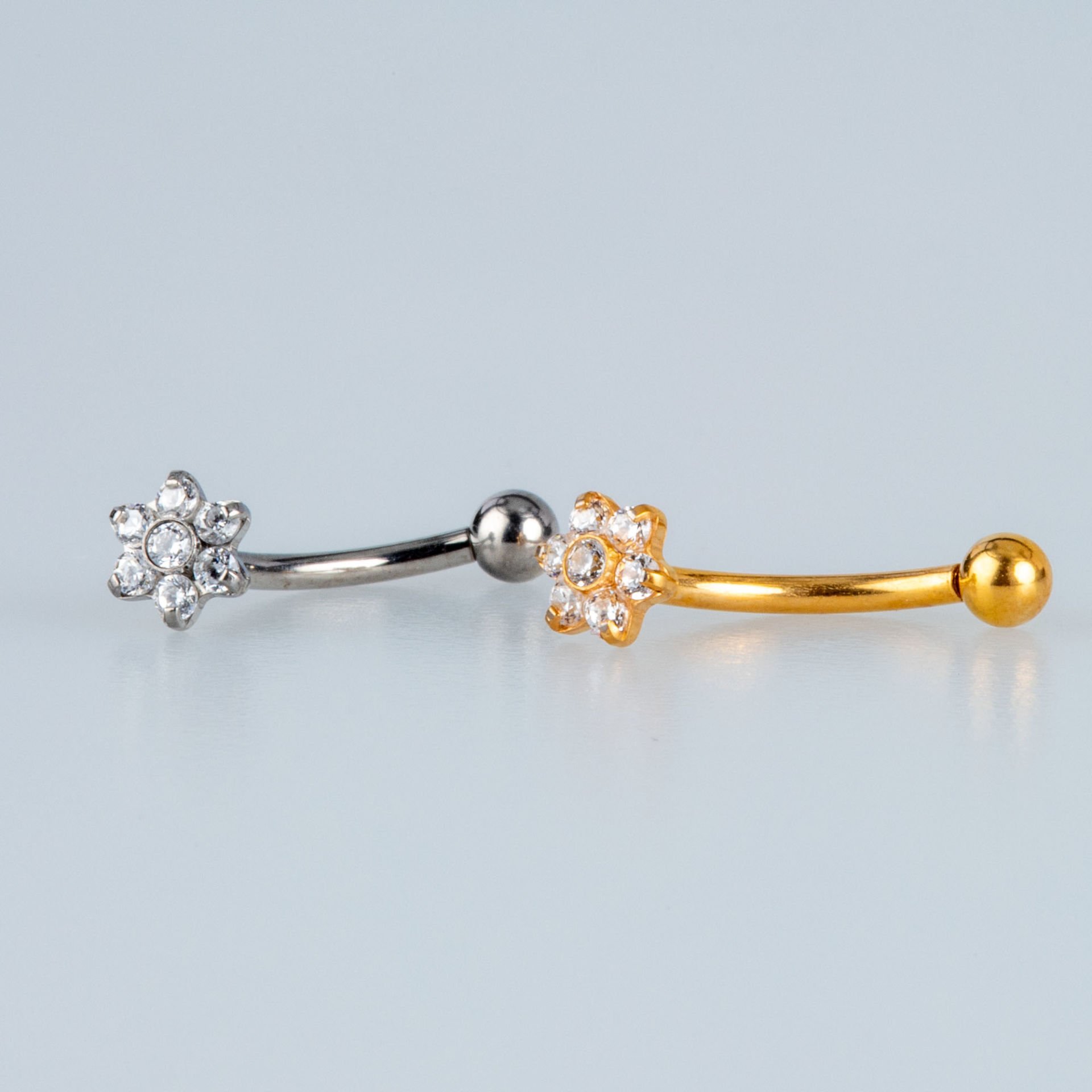 ثقب التيتانيوم على شكل زهرة صفراء